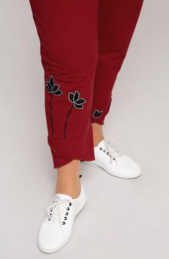 Панталон в цвят бордо със сребърни цветя